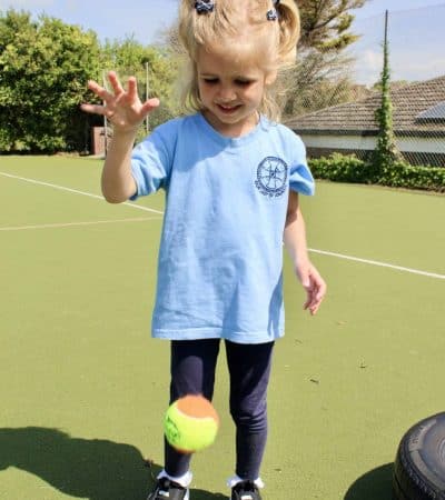 Luisa bouncing tennis ball