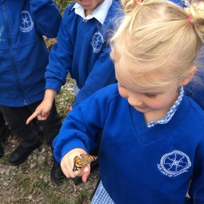 Tabitha holding a butterfly